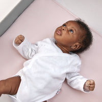 beautiful babygirl laying on a beddybyes rose pink Silk Universal Travel Slip 