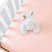 BeddyByes Blush Pink Silk Cotbed Fitted Sheet with bunny rabbit soft toy